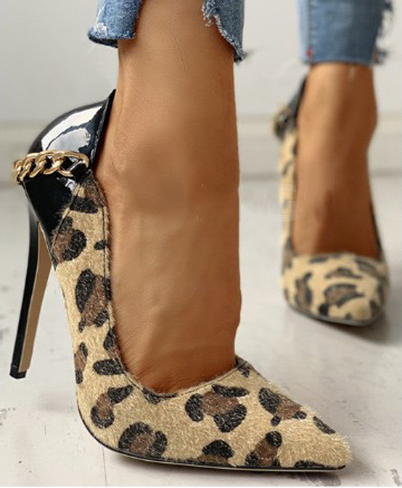 Pointed toe slip-on high heels with metal decoration